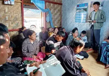 The head of the family says his prayer intentions during the church group