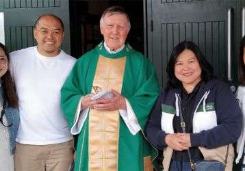 Columban lay missionary Angela Escarsa (right) with Columban Fr. Sean Coyle (center), Columban lay missionary Sherryl Lou Capili, and Sherryl’s brother and sister-in-law during a mission appeal at St. Charles Borromeo in Leixlip, Ireland