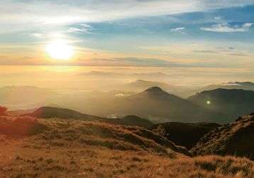 Rolling hills at sunset